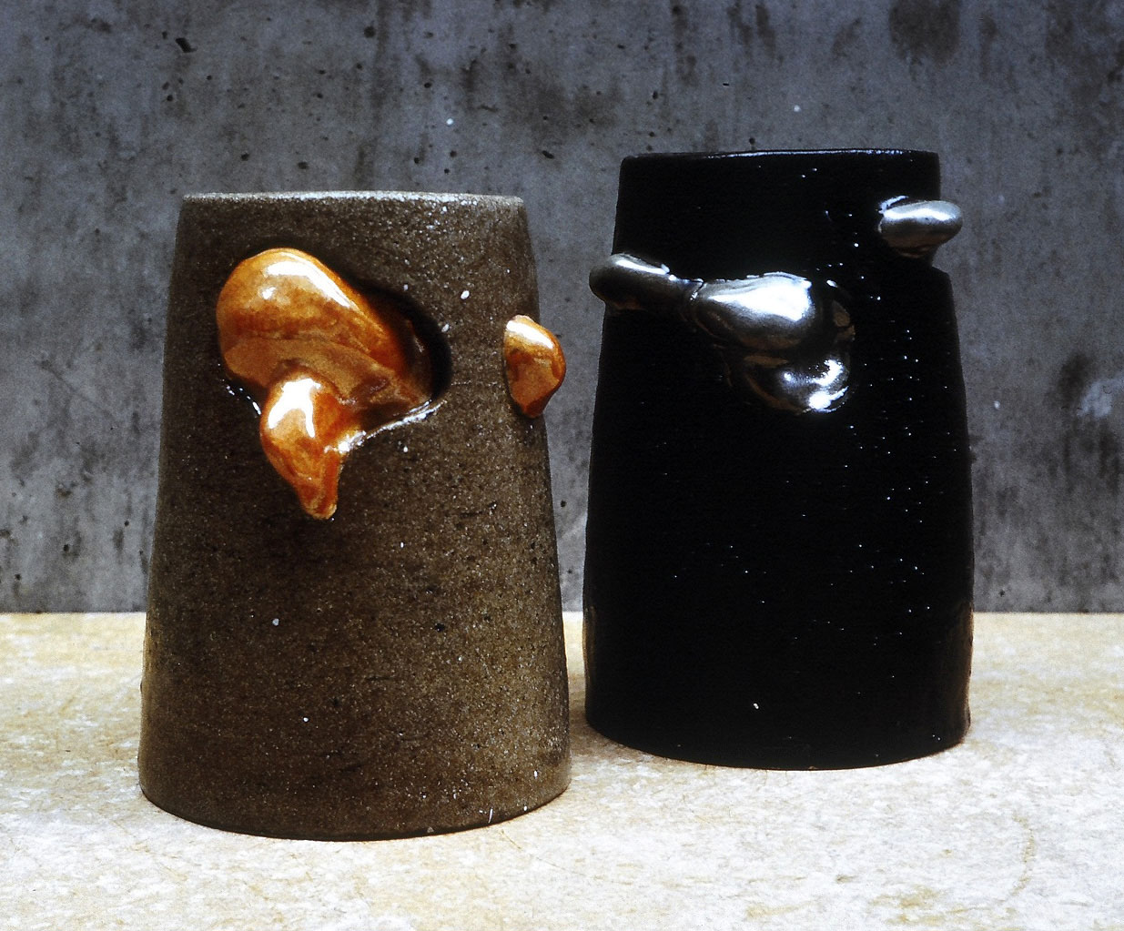 Two vases with forms